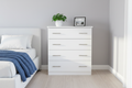 4-Drawer Pedestal styled in bedroom